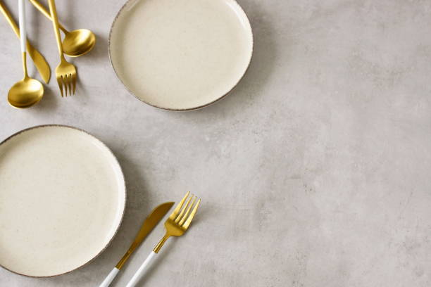 istock Modern minimal table place setting neutral beige color on beige concrete background top view with copy space. 2182615091