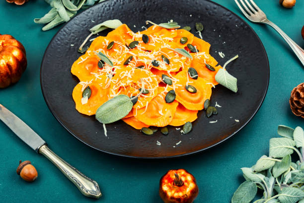 istock Fall pumpkin ravioli drizzled with sage. 2182619393