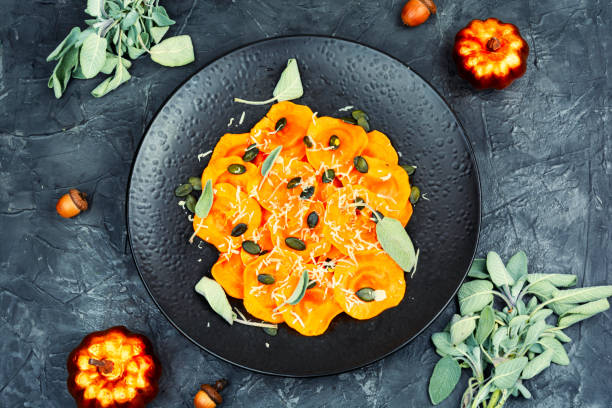 istock Plate of pumpkin ravioli with sage leaves. 2182619528