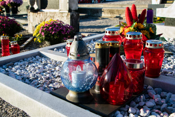 istock Candles on the grave at All Saints Day 2182627652