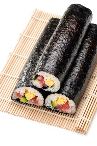 istock Eho-maki are thick sushi rolls which is believed to bring good fortune if eaten while facing the year's 