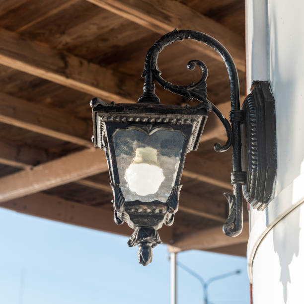 istock antique cast iron street lamp with LED lamp inside 2182637178