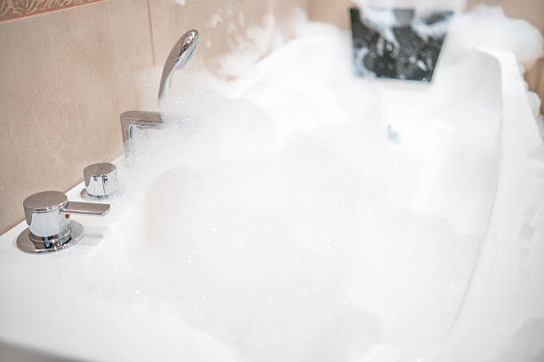 istock Bathtub full of foam. 2182642097