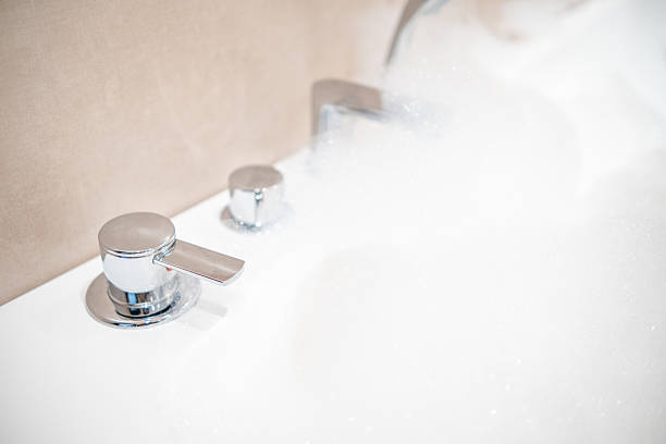 istock Bathtub full of foam. 2182642098