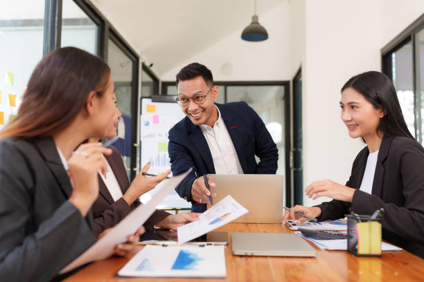 istock Asian Business Group Discuss work Presented at the meeting 2182642214