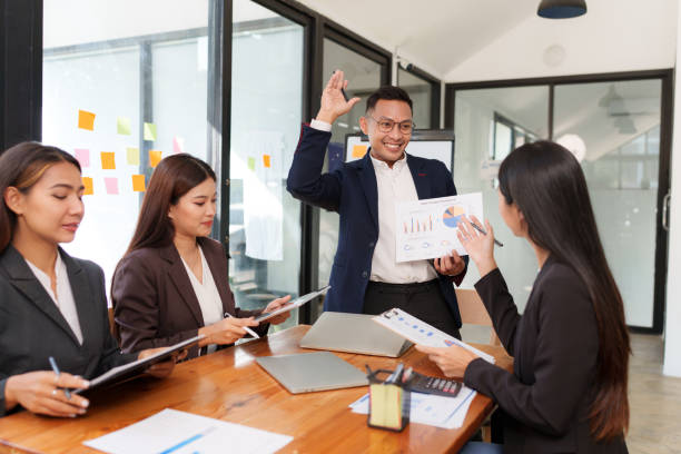 istock Asian Business Group Discuss work Presented at the meeting 2182642215