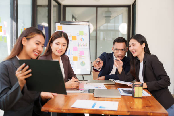 istock Asian Business Group Discuss work Presented at the meeting 2182642250