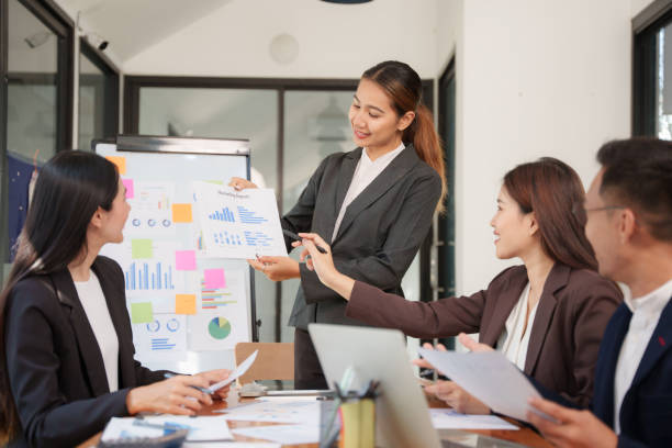 istock Asian Business Group Discuss work Presented at the meeting 2182642311