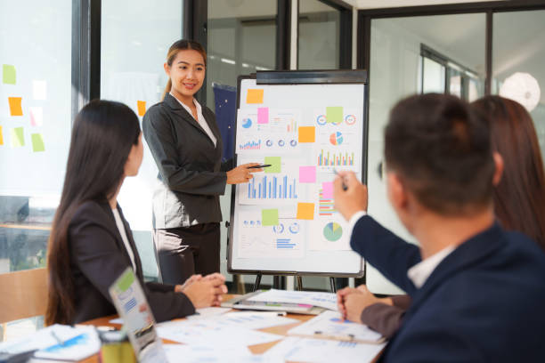 istock Asian Business Group Discuss work Presented at the meeting 2182642329