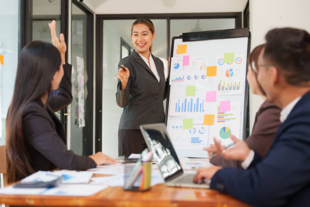 istock Asian Business Group Discuss work Presented at the meeting 2182642338