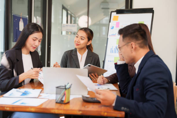 istock Asian Business Group Discuss work Presented at the meeting 2182642362