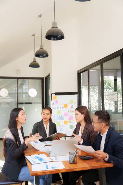 istock Asian Business Group Discuss work Presented at the meeting 2182642366
