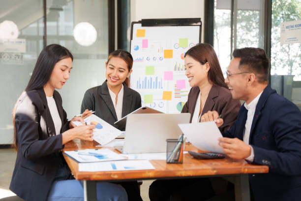istock Asian Business Group Discuss work Presented at the meeting 2182642368