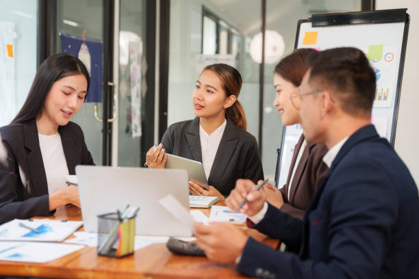 istock Asian Business Group Discuss work Presented at the meeting 2182642371