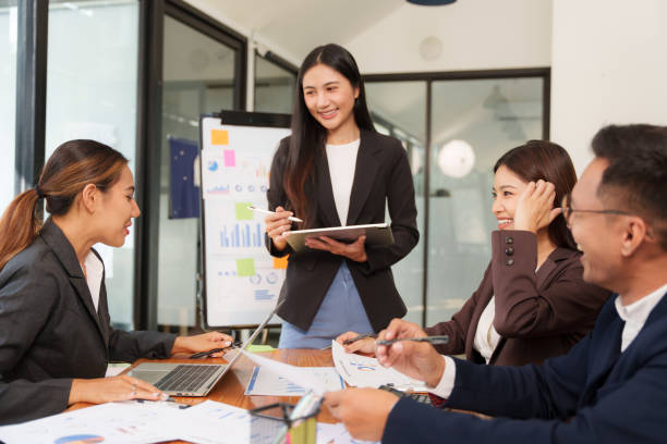 istock Asian Business Group Discuss work Presented at the meeting 2182643457