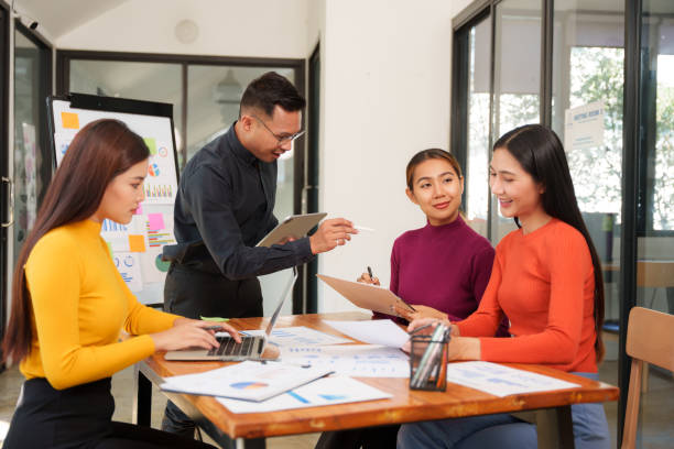 istock Asian Business Group Discuss work Presented at the meeting 2182643520