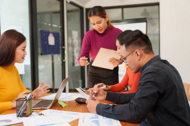 istock Asian Business Group Discuss work Presented at the meeting 2182643700