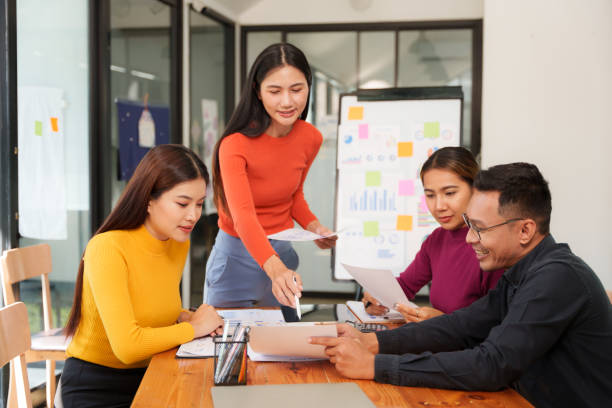 istock Asian Business Group Discuss work Presented at the meeting 2182643726