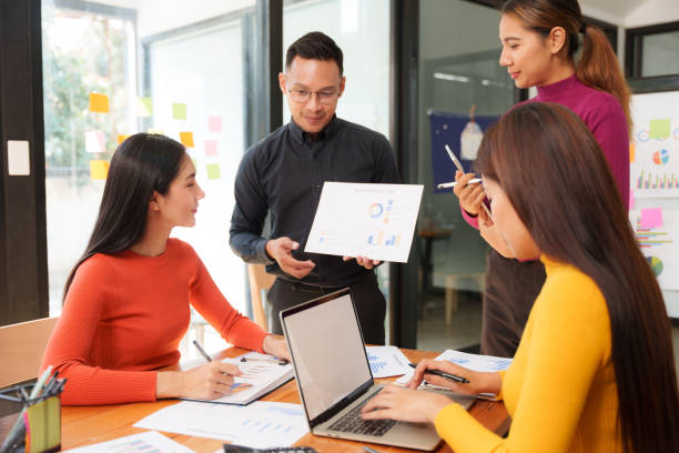 istock Asian Business Group Discuss work Presented at the meeting 2182644965