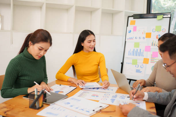 istock Asian Business Group Discuss work Presented at the meeting 2182645138