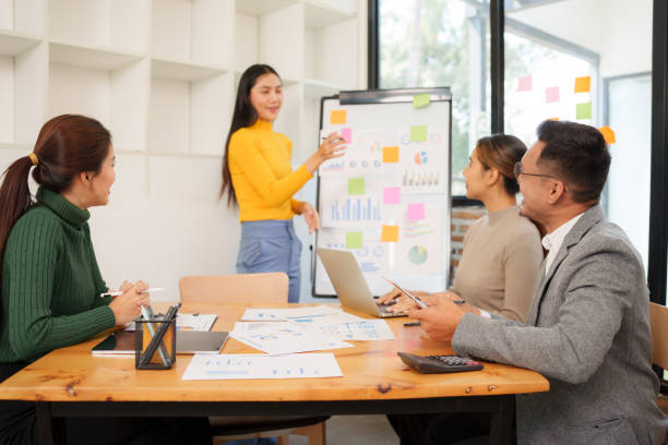istock Asian Business Group Discuss work Presented at the meeting 2182645268