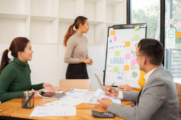istock Asian Business Group Discuss work Presented at the meeting 2182645279