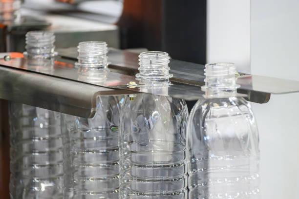 istock The  empty drinking water bottles on the conveyor belt for filling process. 2182647792