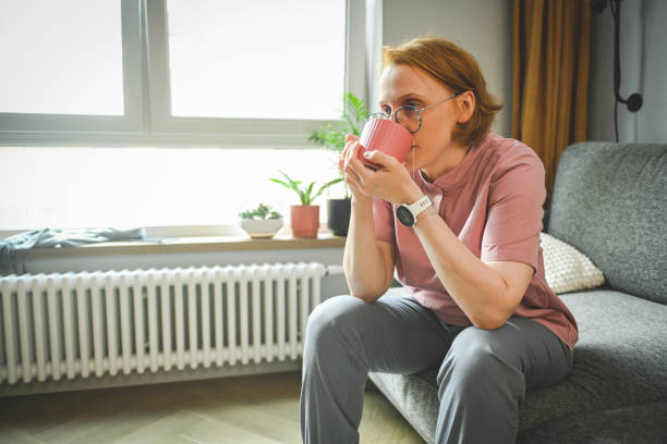 istock Female doctor at home 2182650163