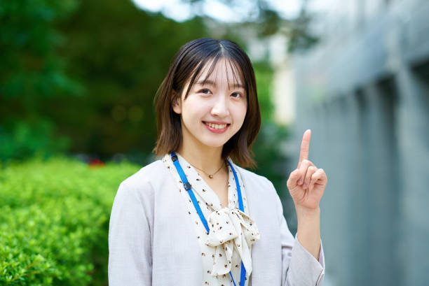 istock Businesswoman pointing up index finger 2182650409