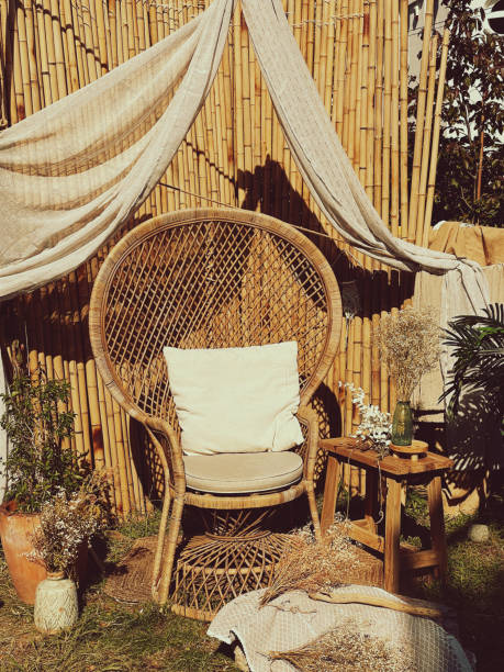 istock Large wicker chair in the garden. 2182650472