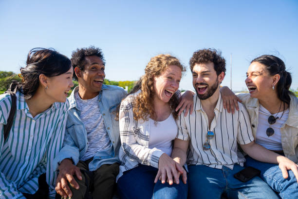 istock Cheerful diverse group of friends having a good time outdoors on a sunny day 2182652068