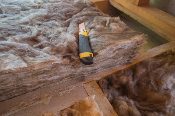 istock construction knife for cutting insulation for laying in a frame house under construction. 2182652073