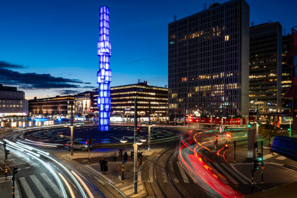 Stockholm, Sweden Oct 6, 2024 A view at night of Sergels Torg in the center of town with fountain and traffic.