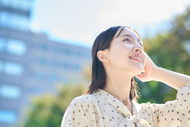 istock a young woman relaxing in green space 2182655077