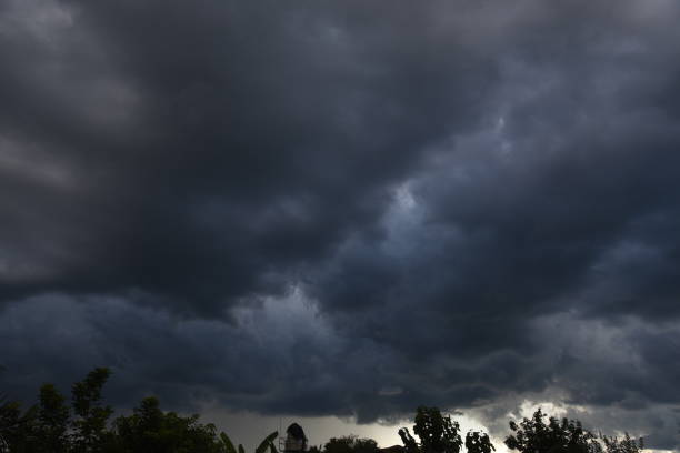 istock Dramatic dark storm rain clouds black sky background. Dark thunderstorm clouds rainny atmosphere. Meteorology danger windstorm disasters climate. Dark cloudscape storm disaster gloomy gray cloud sky 2182655481