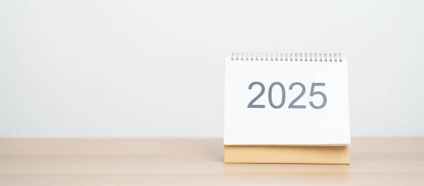 istock 2025 Year Calendar on table in office background. countdown, Happy New Year, Resolution, Year End and New Start and Goals Plan Action Concept 2182658642
