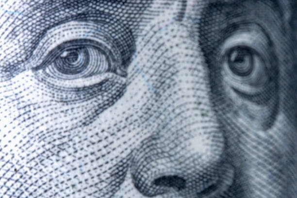 istock Macro image:Benjamin Franklin on the one hundred US Dollar bill. Horizontal image. 2182659108