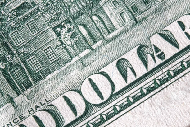 istock Macro image of one hundred US Dollar bill with description: DOLLAR 2182659438