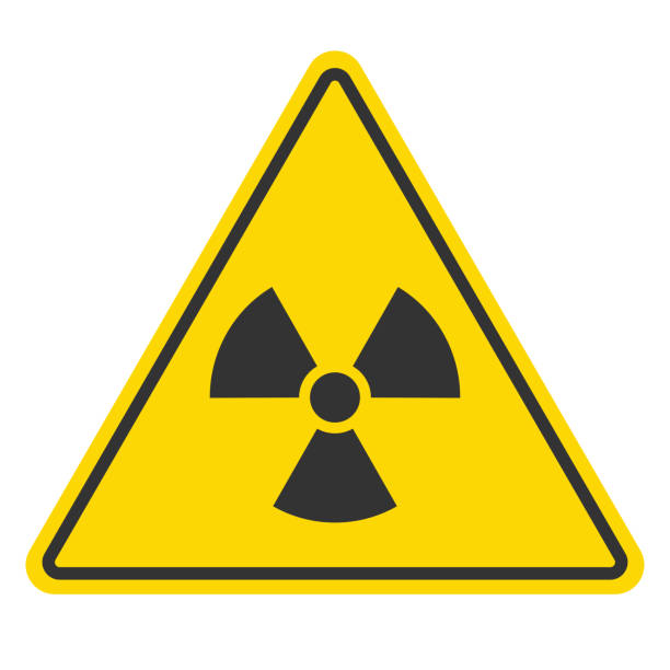Radiation Warning Sign A yellow triangular warning sign with a black radiation symbol, indicating radioactive materials or radiation hazard. hazardous waste symbol stock illustrations
