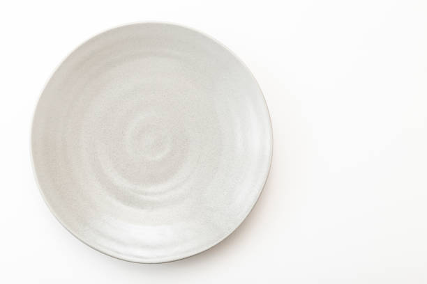 istock Gray round plate on a white background. 2182661878