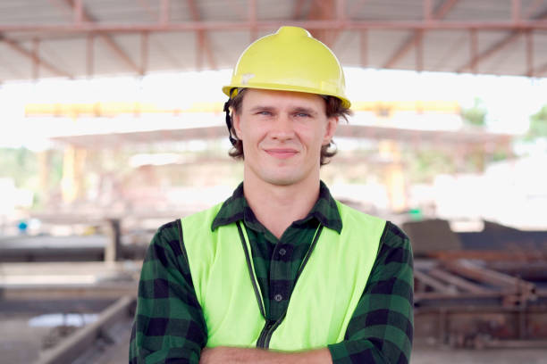 istock Male caucasian engineer is looking and smiling at camera. 2182665848