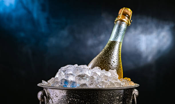 istock Bottle of sparkiling wine in bucket with crushed ice. 2182666177