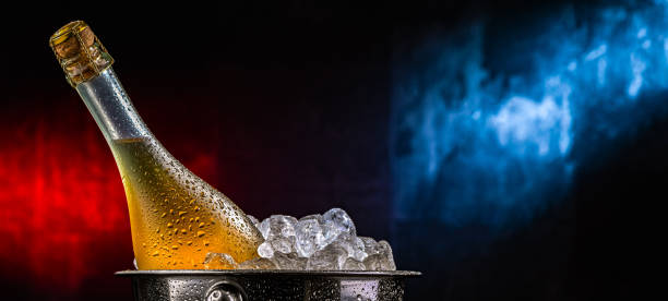 istock Bottle of sparkiling wine in bucket with crushed ice. 2182666203