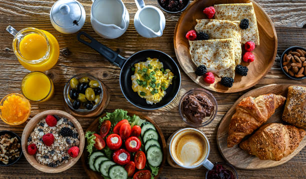 istock Breakfast served with coffee, eggs, cereals nd croissants 2182667728