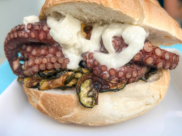 istock burger with fried octopus and zucchini in a bun bread 2182667768