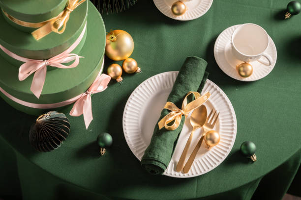 istock Unique green table set for Christmas with Christmas decorations. 2182670727