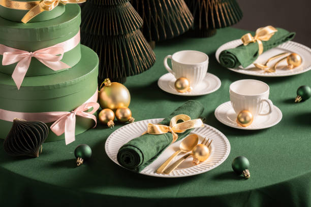 istock Lovely green table set for Christmas with baubles and decorations. 2182670755
