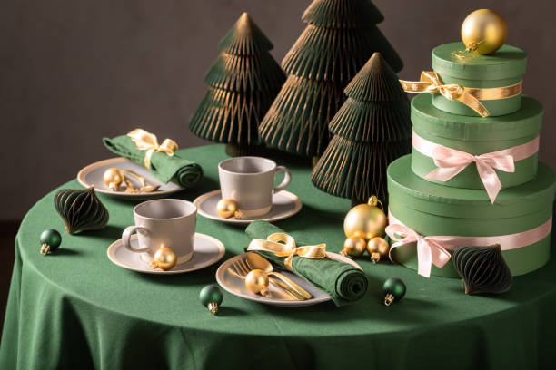 istock Unique green table set for Christmas with bubbles and gifts. 2182670851
