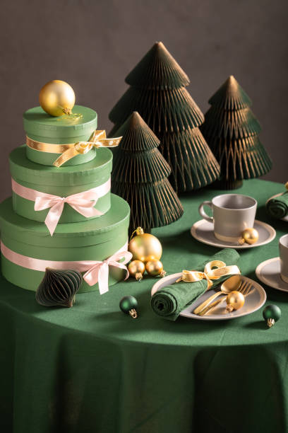 istock Unique green table set for Christmas with baubles and decorations. 2182670873