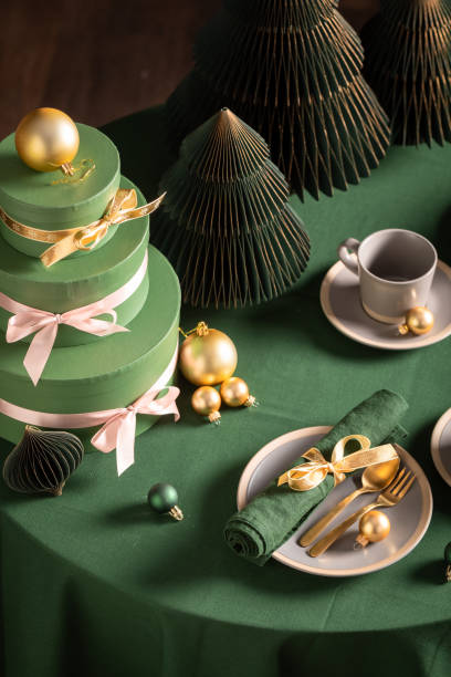 istock Wonderful green Christmas tableware for two as gift card. 2182670881